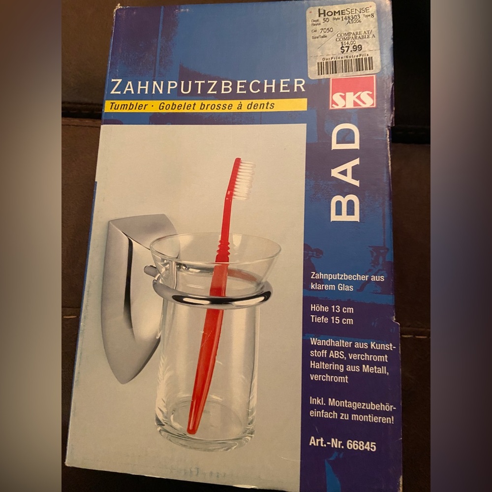 Glass tumbler with metallic look plastic holder - New